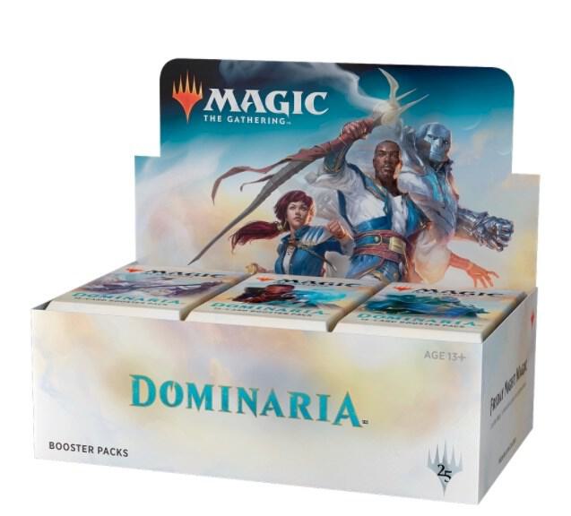 Box of Dominaria collectible booster packs with fantasy artwork stacked on a tabletop, showing vibrant colors