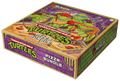 Stacked Magic: The Gathering card sleeves and booster packs with Teenage Mutant Ninja Turtles pizza-themed artwork on a wooden table