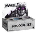 Box of 36 Magic 2015 booster packs with illustrated fantasy card art spilling slightly from the opened top