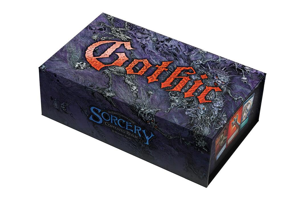 Gothic booster box with dark ornate artwork and stylized logo sitting on a textured stone surface